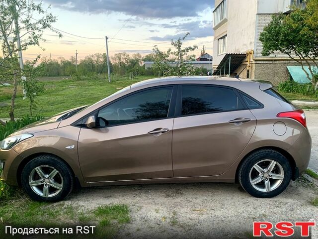 Коричневый Хендай i30, объемом двигателя 1.3 л и пробегом 158 тыс. км за 7500 $, фото 2 на Automoto.ua