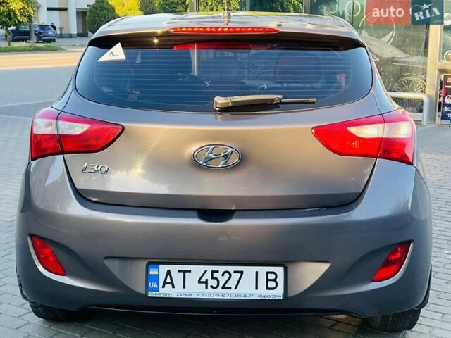 Коричневый Хендай i30, объемом двигателя 1.4 л и пробегом 124 тыс. км за 8500 $, фото 4 на Automoto.ua