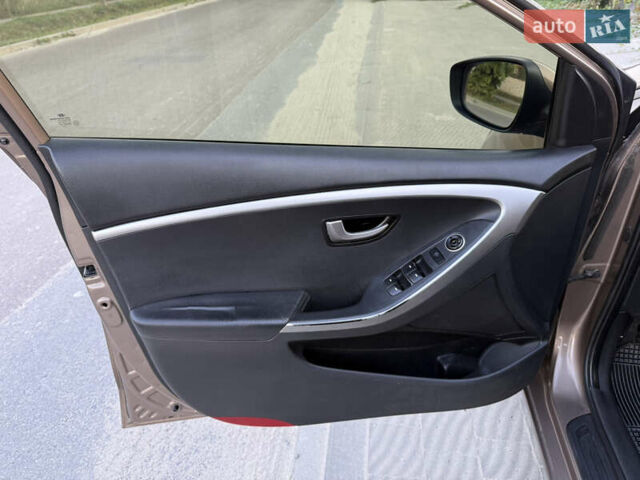 Коричневий Хендай i30, об'ємом двигуна 1.4 л та пробігом 220 тис. км за 6500 $, фото 21 на Automoto.ua