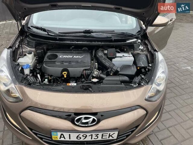 Коричневый Хендай i30, объемом двигателя 1.58 л и пробегом 149 тыс. км за 8999 $, фото 3 на Automoto.ua