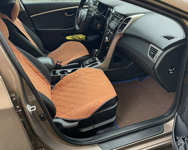 Коричневый Хендай i30, объемом двигателя 1.6 л и пробегом 119 тыс. км за 12950 $, фото 28 на Automoto.ua