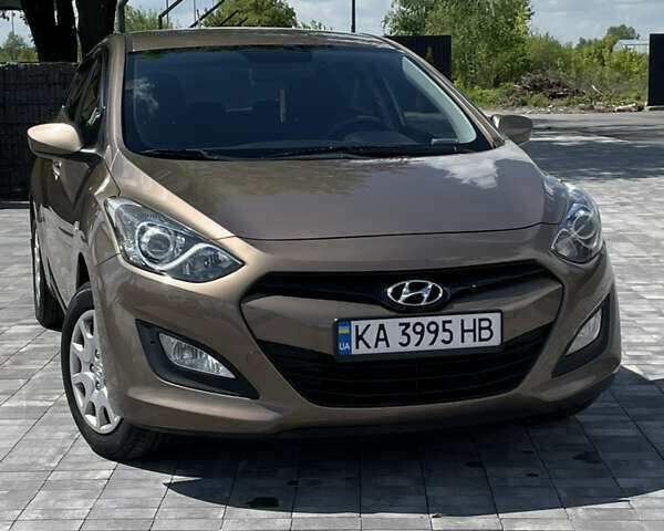 Коричневий Хендай i30, об'ємом двигуна 1.4 л та пробігом 144 тис. км за 8900 $, фото 7 на Automoto.ua