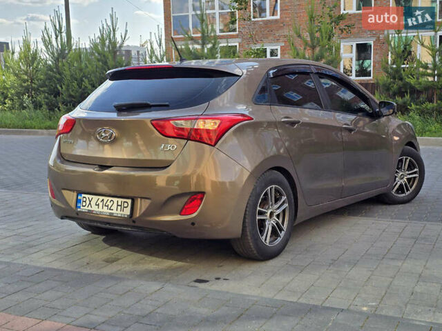 Хендай i30 2014 в Черновцах на Automoto.ua Коричневый Хендай i30, объемом двигателя 1.4 л и пробегом 200 тыс. км за 7800 $, фото 6 на Automoto.ua