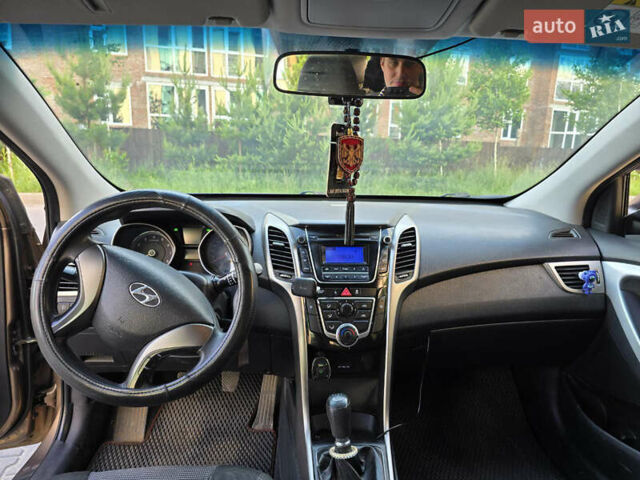 Хендай i30 2014 в Черновцах на Automoto.ua Коричневый Хендай i30, объемом двигателя 1.4 л и пробегом 200 тыс. км за 7800 $, фото 12 на Automoto.ua