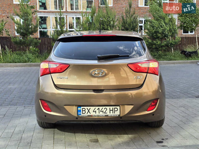 Хендай i30 2014 в Черновцах на Automoto.ua Коричневый Хендай i30, объемом двигателя 1.4 л и пробегом 200 тыс. км за 7800 $, фото 7 на Automoto.ua