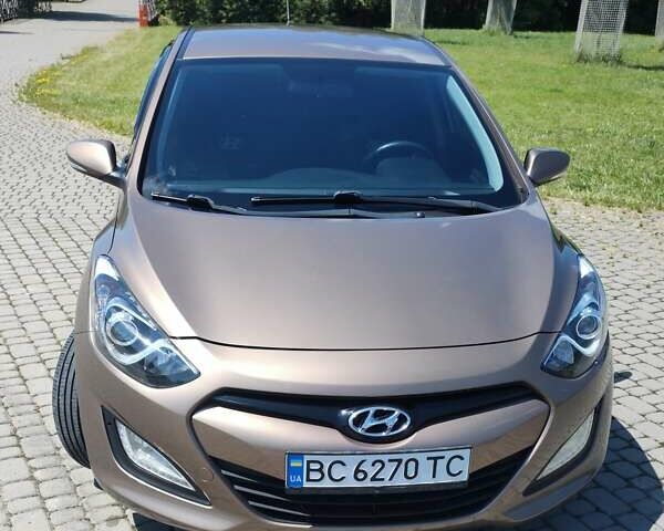 Коричневый Хендай i30, объемом двигателя 1.4 л и пробегом 125 тыс. км за 9200 $, фото 2 на Automoto.ua