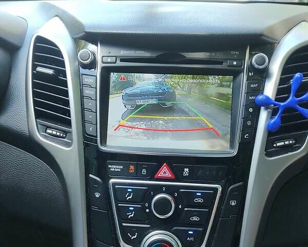 Коричневый Хендай i30, объемом двигателя 1.4 л и пробегом 125 тыс. км за 9200 $, фото 11 на Automoto.ua