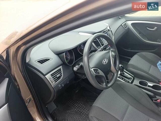 Коричневый Хендай i30, объемом двигателя 1.58 л и пробегом 56 тыс. км за 13650 $, фото 12 на Automoto.ua