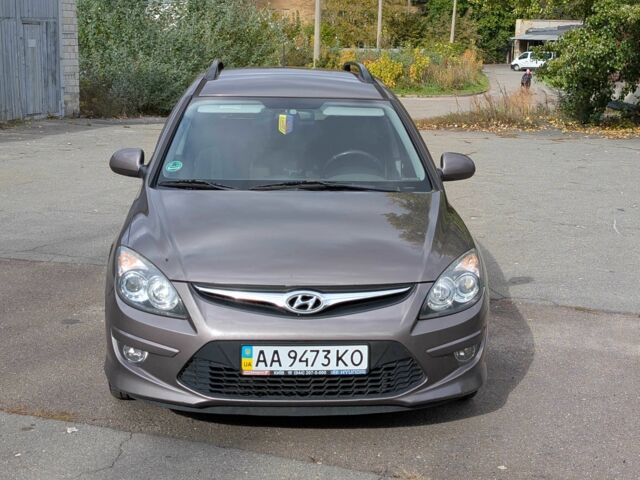 Коричневый Хендай i30, объемом двигателя 1.6 л и пробегом 236 тыс. км за 7200 $, фото 7 на Automoto.ua