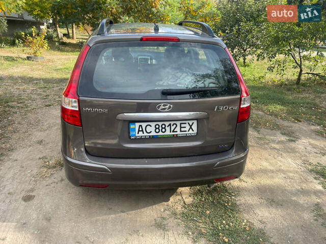 Коричневый Хендай i30, объемом двигателя 1.58 л и пробегом 211 тыс. км за 7500 $, фото 4 на Automoto.ua