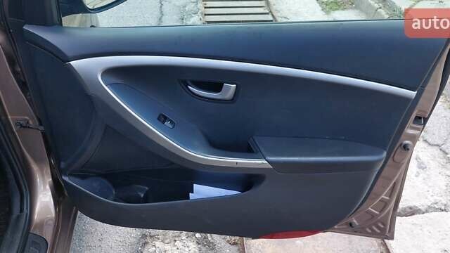 Коричневий Хендай i30, об'ємом двигуна 1.58 л та пробігом 149 тис. км за 9500 $, фото 11 на Automoto.ua