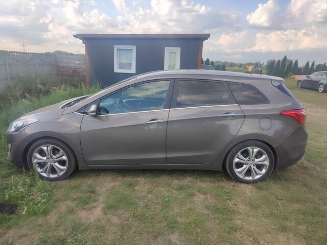 Коричневый Хендай i30, объемом двигателя 1 л и пробегом 200 тыс. км за 7500 $, фото 2 на Automoto.ua