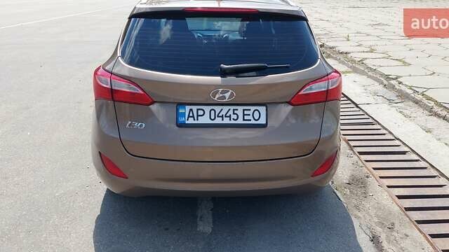 Коричневий Хендай i30, об'ємом двигуна 1.58 л та пробігом 149 тис. км за 9500 $, фото 2 на Automoto.ua