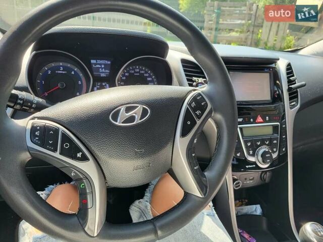 Коричневий Хендай i30, об'ємом двигуна 1.58 л та пробігом 234 тис. км за 9100 $, фото 11 на Automoto.ua