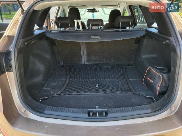 Коричневий Хендай i30, об'ємом двигуна 1.58 л та пробігом 234 тис. км за 9100 $, фото 4 на Automoto.ua