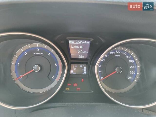 Коричневий Хендай i30, об'ємом двигуна 1.58 л та пробігом 234 тис. км за 9100 $, фото 9 на Automoto.ua