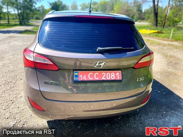 Коричневий Хендай i30, об'ємом двигуна 1.6 л та пробігом 251 тис. км за 8900 $, фото 4 на Automoto.ua