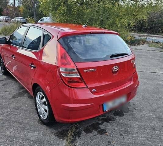 Червоний Хендай i30, об'ємом двигуна 1.4 л та пробігом 197 тис. км за 4047 $, фото 2 на Automoto.ua