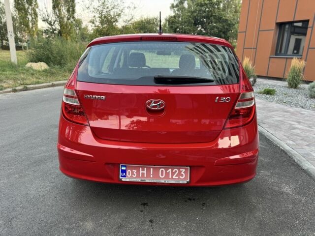 Красный Хендай i30, объемом двигателя 1.4 л и пробегом 202 тыс. км за 5999 $, фото 4 на Automoto.ua