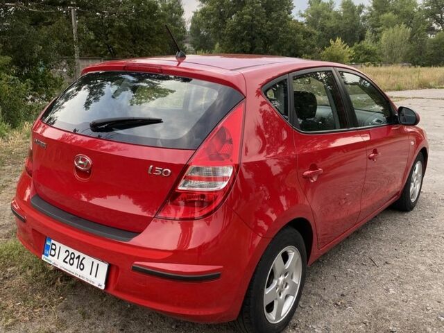 Красный Хендай i30, объемом двигателя 1.4 л и пробегом 203 тыс. км за 5600 $, фото 3 на Automoto.ua