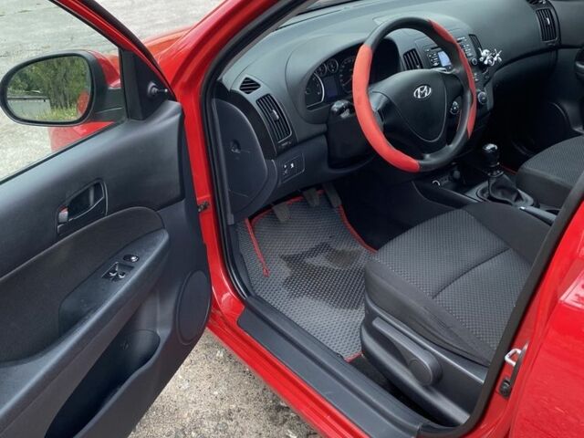Красный Хендай i30, объемом двигателя 1.4 л и пробегом 203 тыс. км за 5600 $, фото 12 на Automoto.ua