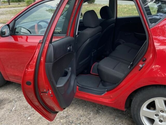 Красный Хендай i30, объемом двигателя 1.4 л и пробегом 203 тыс. км за 5600 $, фото 11 на Automoto.ua