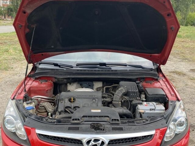 Красный Хендай i30, объемом двигателя 1.4 л и пробегом 203 тыс. км за 5600 $, фото 16 на Automoto.ua