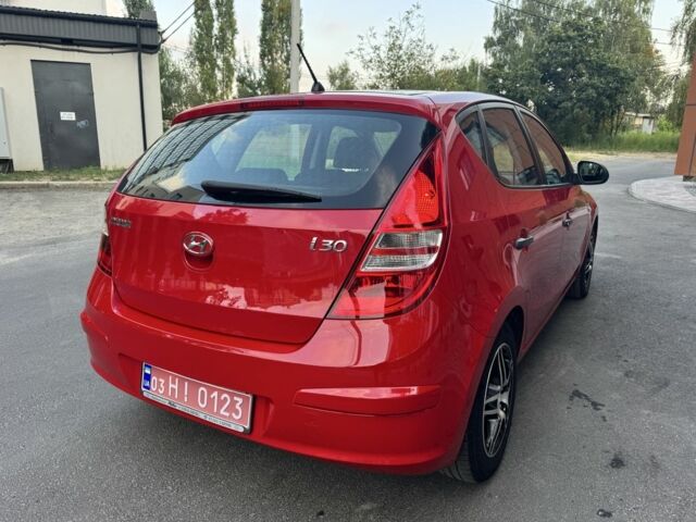 Красный Хендай i30, объемом двигателя 1.4 л и пробегом 202 тыс. км за 5999 $, фото 5 на Automoto.ua
