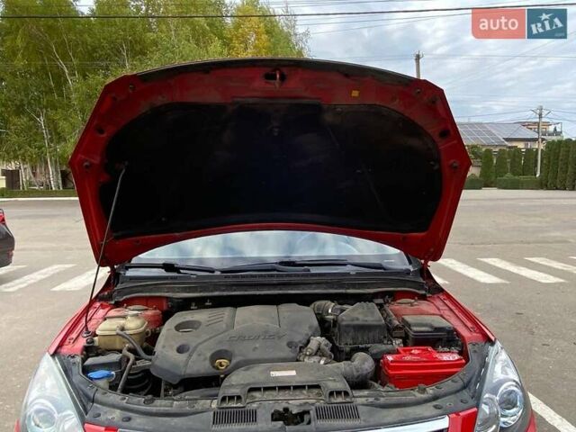 Красный Хендай i30, объемом двигателя 1.58 л и пробегом 236 тыс. км за 5000 $, фото 5 на Automoto.ua