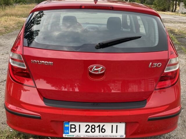 Красный Хендай i30, объемом двигателя 1.4 л и пробегом 203 тыс. км за 5600 $, фото 4 на Automoto.ua