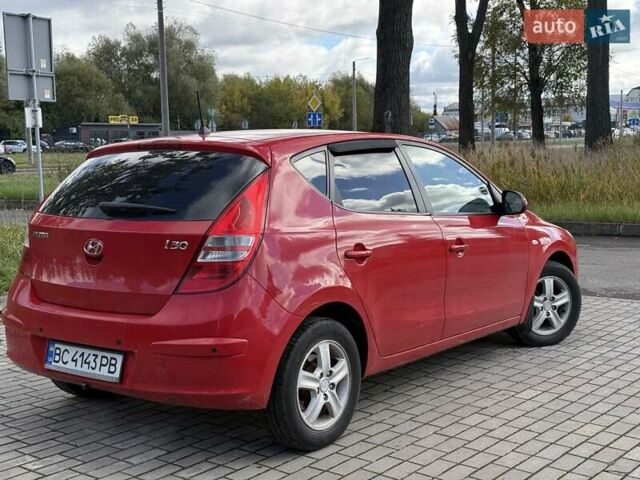 Красный Хендай i30, объемом двигателя 1.6 л и пробегом 135 тыс. км за 5900 $, фото 3 на Automoto.ua