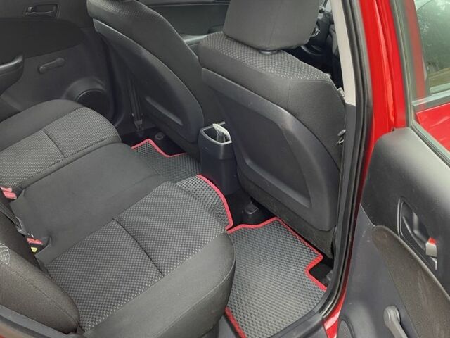 Красный Хендай i30, объемом двигателя 1.4 л и пробегом 203 тыс. км за 5600 $, фото 9 на Automoto.ua
