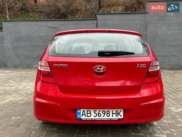 Красный Хендай i30, объемом двигателя 1.4 л и пробегом 234 тыс. км за 5250 $, фото 20 на Automoto.ua