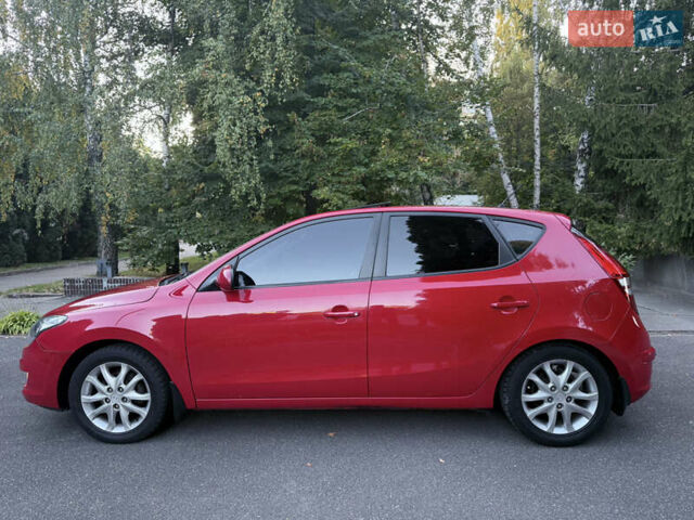 Красный Хендай i30, объемом двигателя 1.6 л и пробегом 161 тыс. км за 7000 $, фото 7 на Automoto.ua