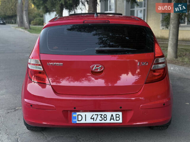 Красный Хендай i30, объемом двигателя 1.6 л и пробегом 161 тыс. км за 7000 $, фото 8 на Automoto.ua