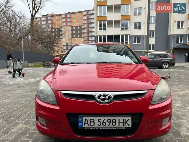 Красный Хендай i30, объемом двигателя 1.4 л и пробегом 234 тыс. км за 5250 $, фото 25 на Automoto.ua