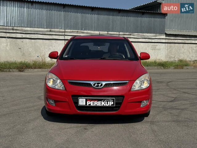Червоний Хендай i30, об'ємом двигуна 1.59 л та пробігом 159 тис. км за 7399 $, фото 1 на Automoto.ua