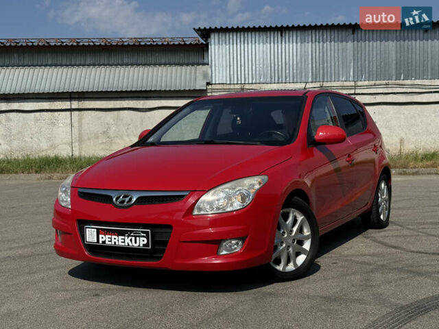 Червоний Хендай i30, об'ємом двигуна 1.59 л та пробігом 159 тис. км за 7399 $, фото 2 на Automoto.ua