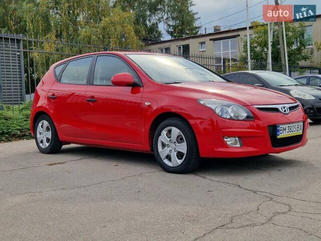 Красный Хендай i30, объемом двигателя 1.4 л и пробегом 201 тыс. км за 6500 $, фото 6 на Automoto.ua