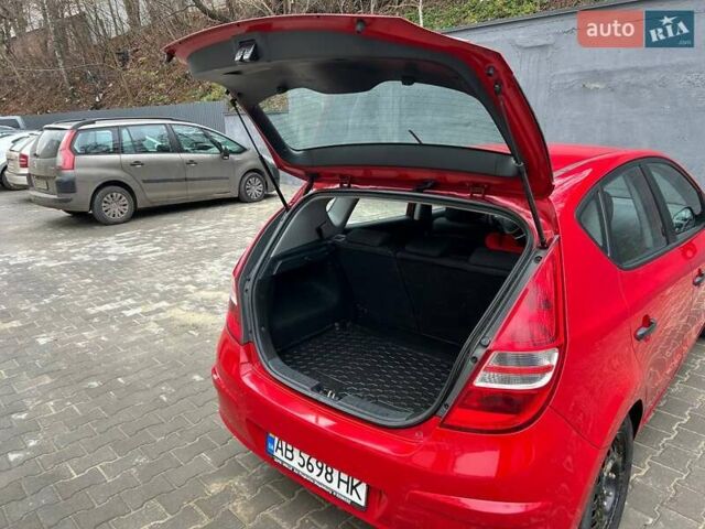 Красный Хендай i30, объемом двигателя 1.4 л и пробегом 234 тыс. км за 5250 $, фото 3 на Automoto.ua
