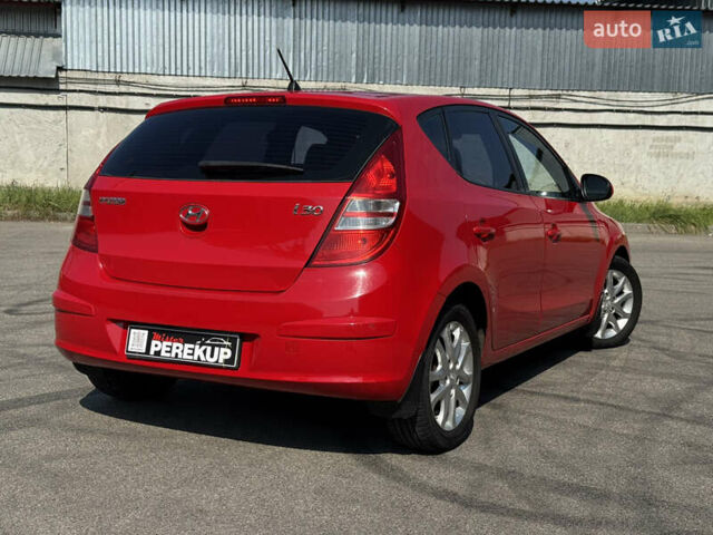 Червоний Хендай i30, об'ємом двигуна 1.59 л та пробігом 159 тис. км за 7399 $, фото 5 на Automoto.ua