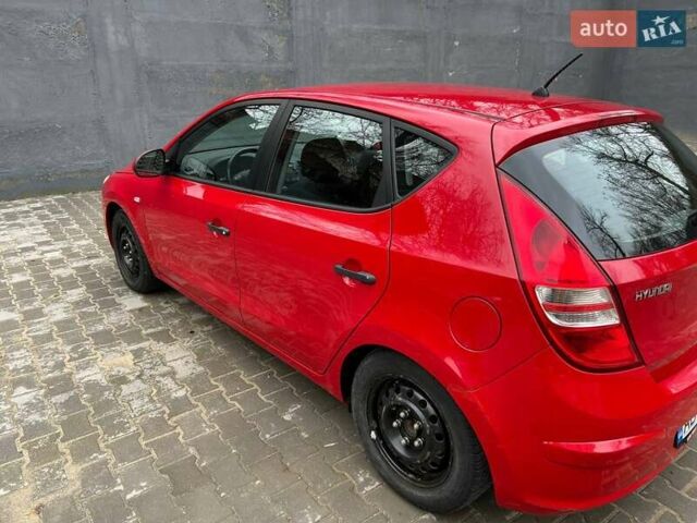 Красный Хендай i30, объемом двигателя 1.4 л и пробегом 234 тыс. км за 5250 $, фото 18 на Automoto.ua
