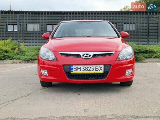 Красный Хендай i30, объемом двигателя 1.4 л и пробегом 201 тыс. км за 6500 $, фото 3 на Automoto.ua