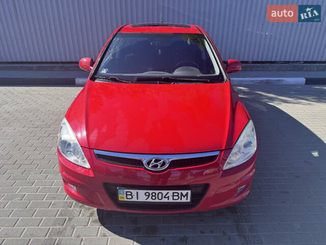 Красный Хендай i30, объемом двигателя 1.6 л и пробегом 159 тыс. км за 7399 $, фото 1 на Automoto.ua
