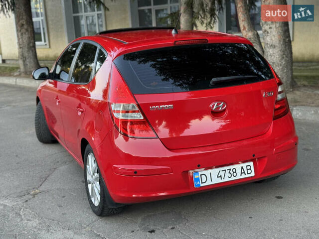 Красный Хендай i30, объемом двигателя 1.6 л и пробегом 161 тыс. км за 7000 $, фото 3 на Automoto.ua