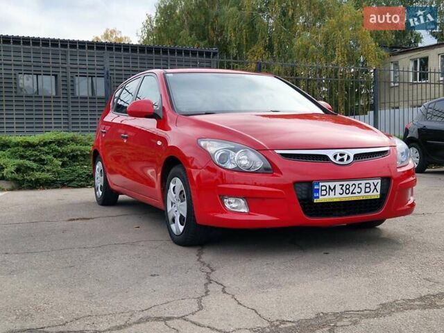 Красный Хендай i30, объемом двигателя 1.4 л и пробегом 201 тыс. км за 6500 $, фото 5 на Automoto.ua