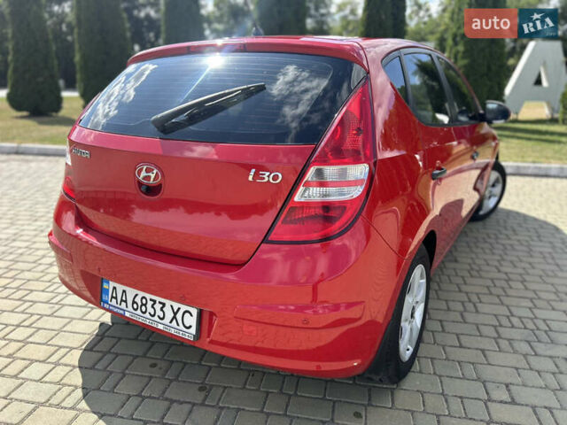 Червоний Хендай i30, об'ємом двигуна 1.59 л та пробігом 190 тис. км за 7300 $, фото 23 на Automoto.ua