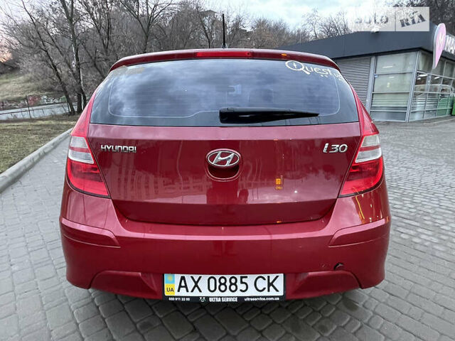 Красный Хендай i30, объемом двигателя 1.4 л и пробегом 122 тыс. км за 5700 $, фото 4 на Automoto.ua