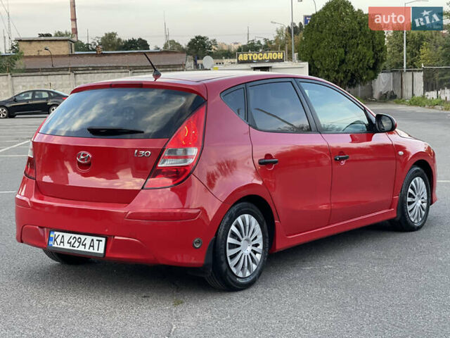 Красный Хендай i30, объемом двигателя 1.59 л и пробегом 166 тыс. км за 7500 $, фото 4 на Automoto.ua