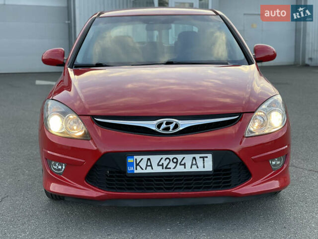 Красный Хендай i30, объемом двигателя 1.59 л и пробегом 166 тыс. км за 7500 $, фото 7 на Automoto.ua